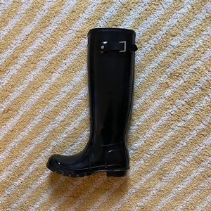 Tall patent black Hunter rain boots